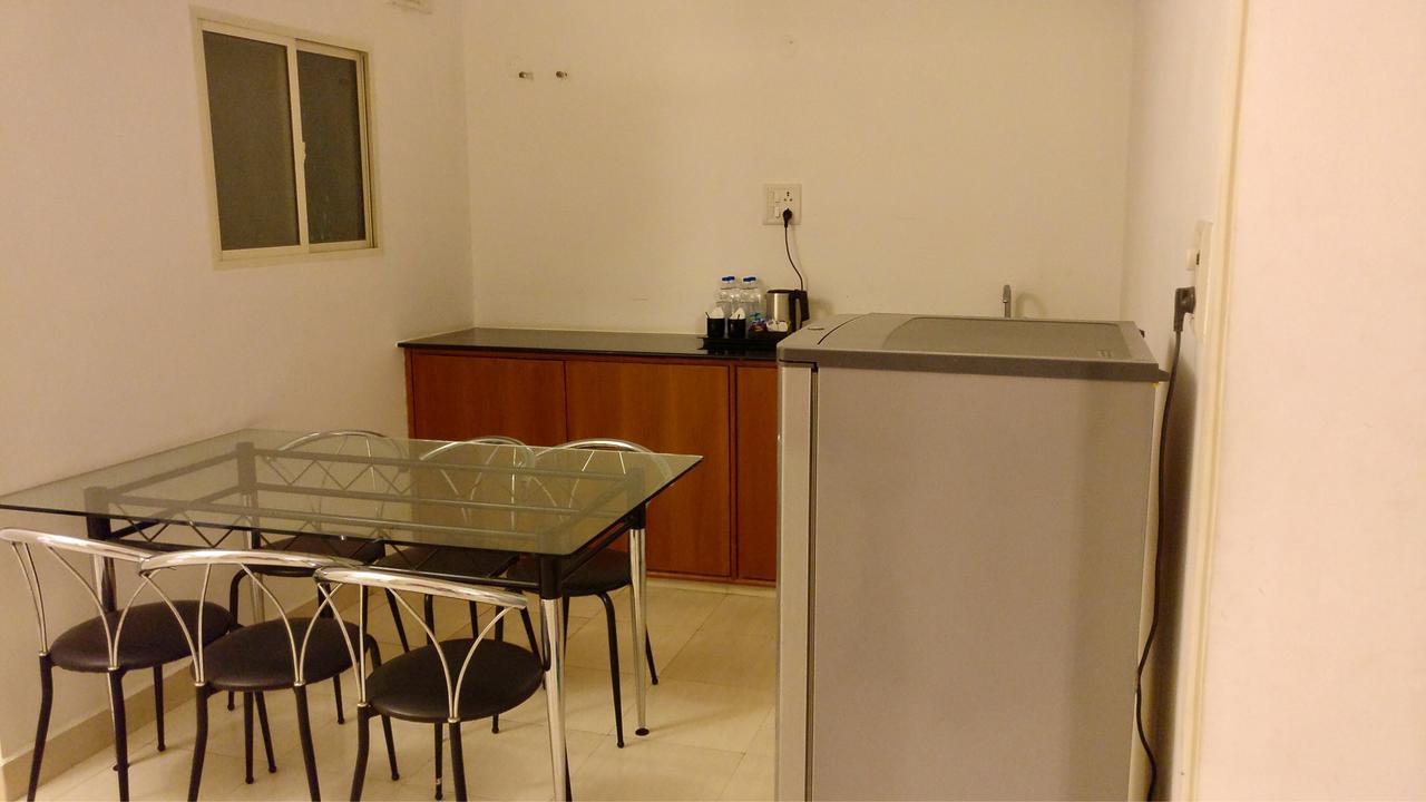 Sai Towers Hotel Puttaparthi Buitenkant foto